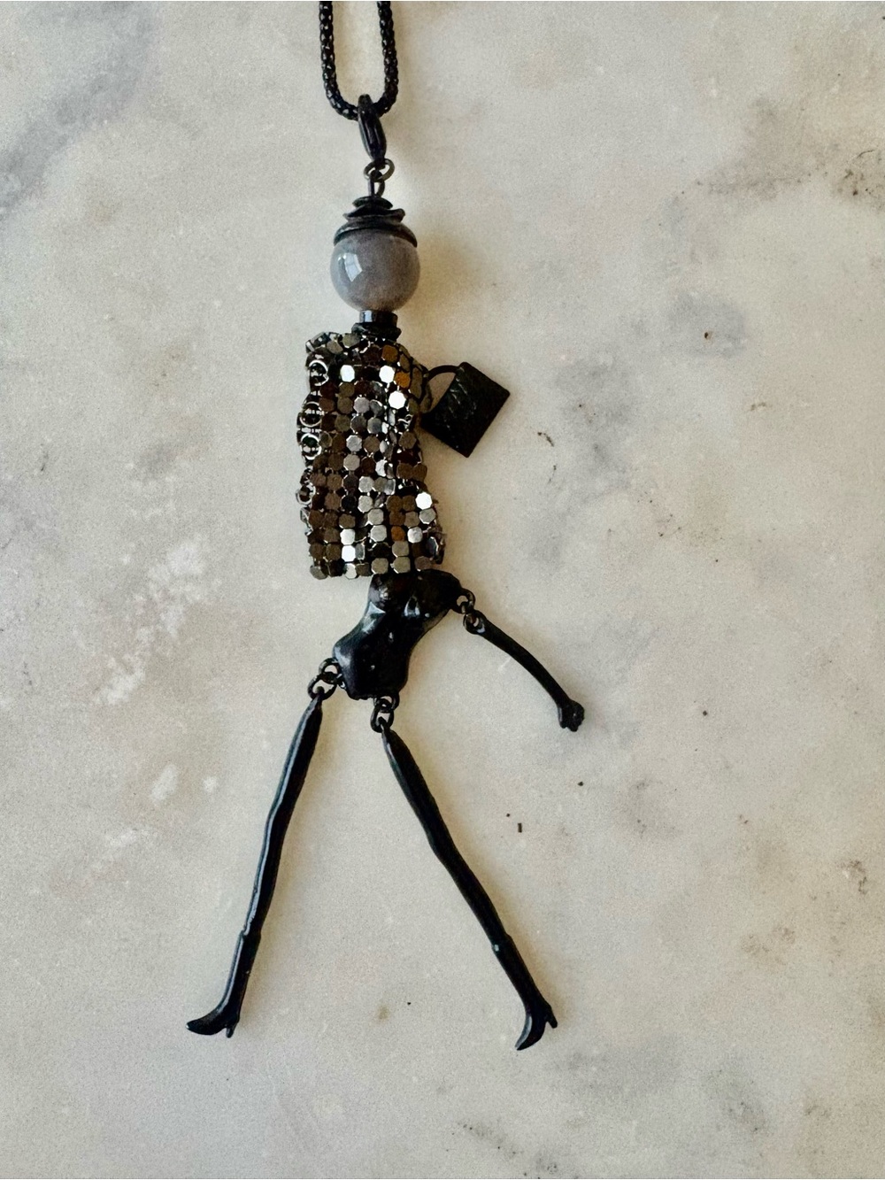 Source Unknown Black and Gunmetal Walking Doll Pendant Necklace